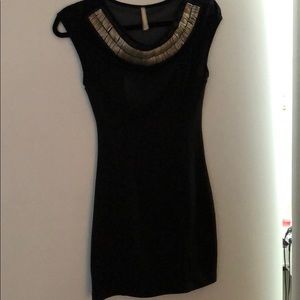 Black mini dress with mesh and beaded neckline